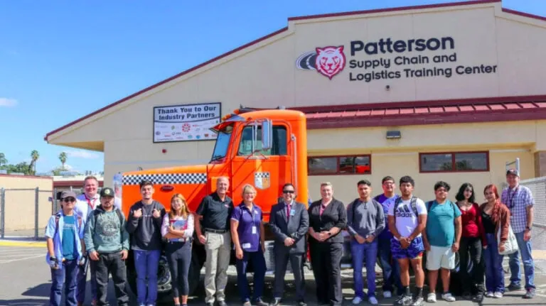 Dave with students orange truck